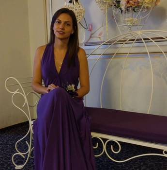 Image may contain: 1 person, smiling